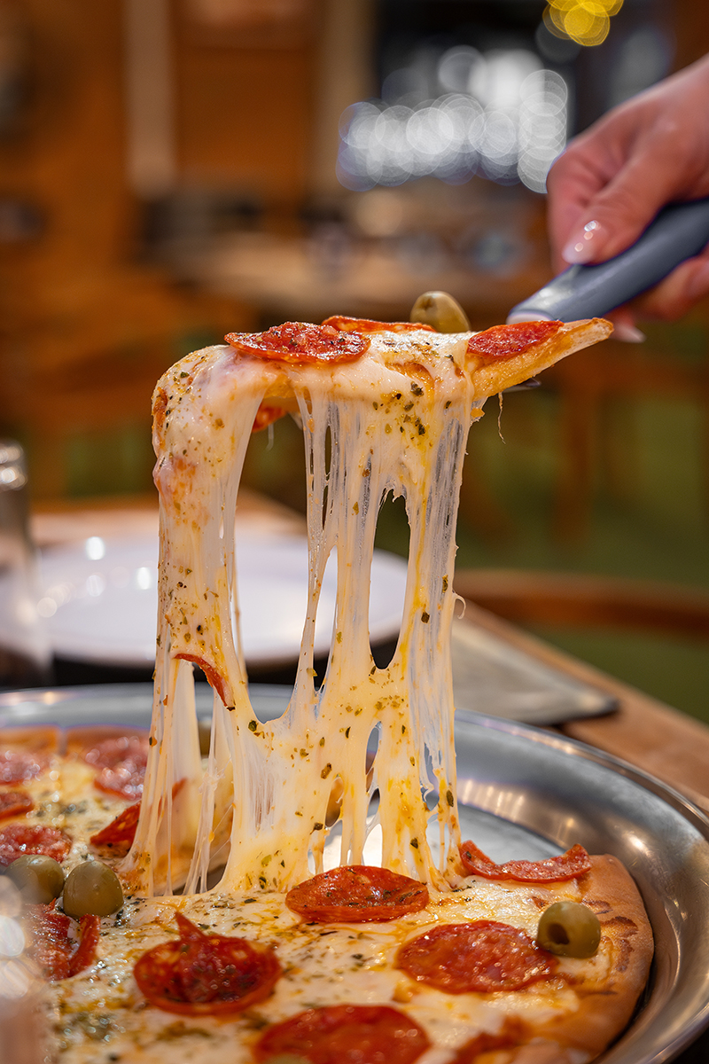 Pizza con queso fundido