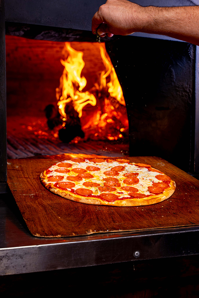 Pizza al horno de leña en La Tarantella